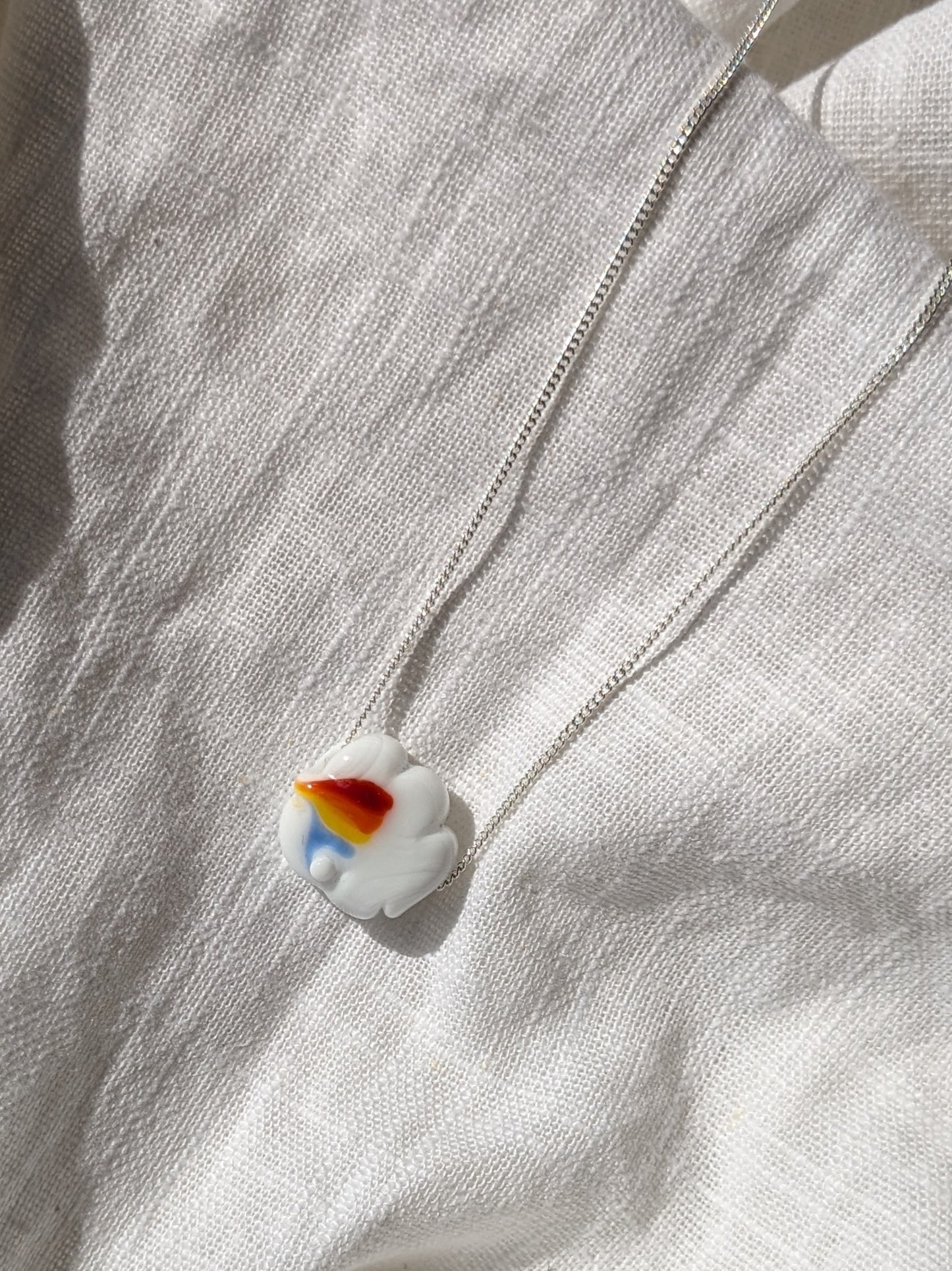 Another World Belfast Rainbow Cloud Collab necklace