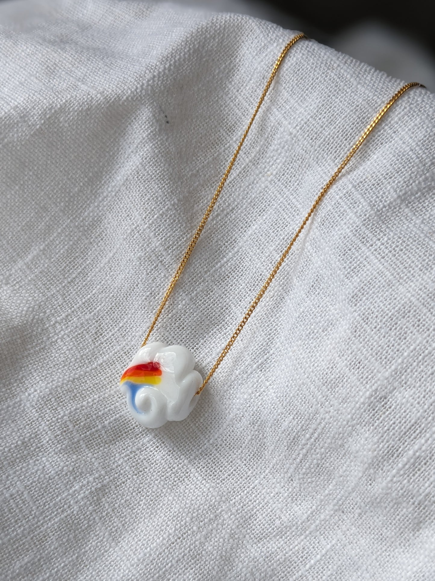 Another World Belfast Rainbow Cloud Collab necklace