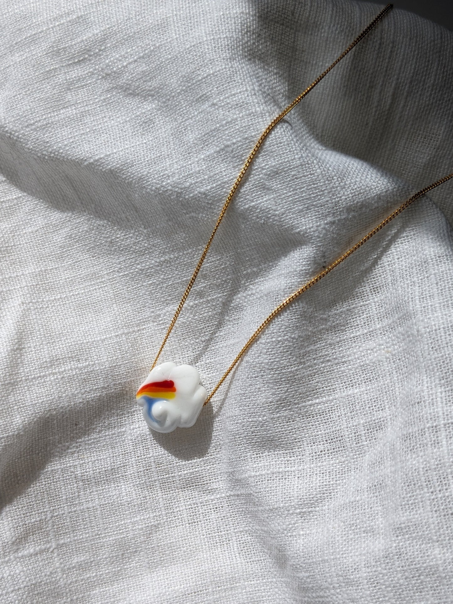 Another World Belfast Rainbow Cloud Collab necklace