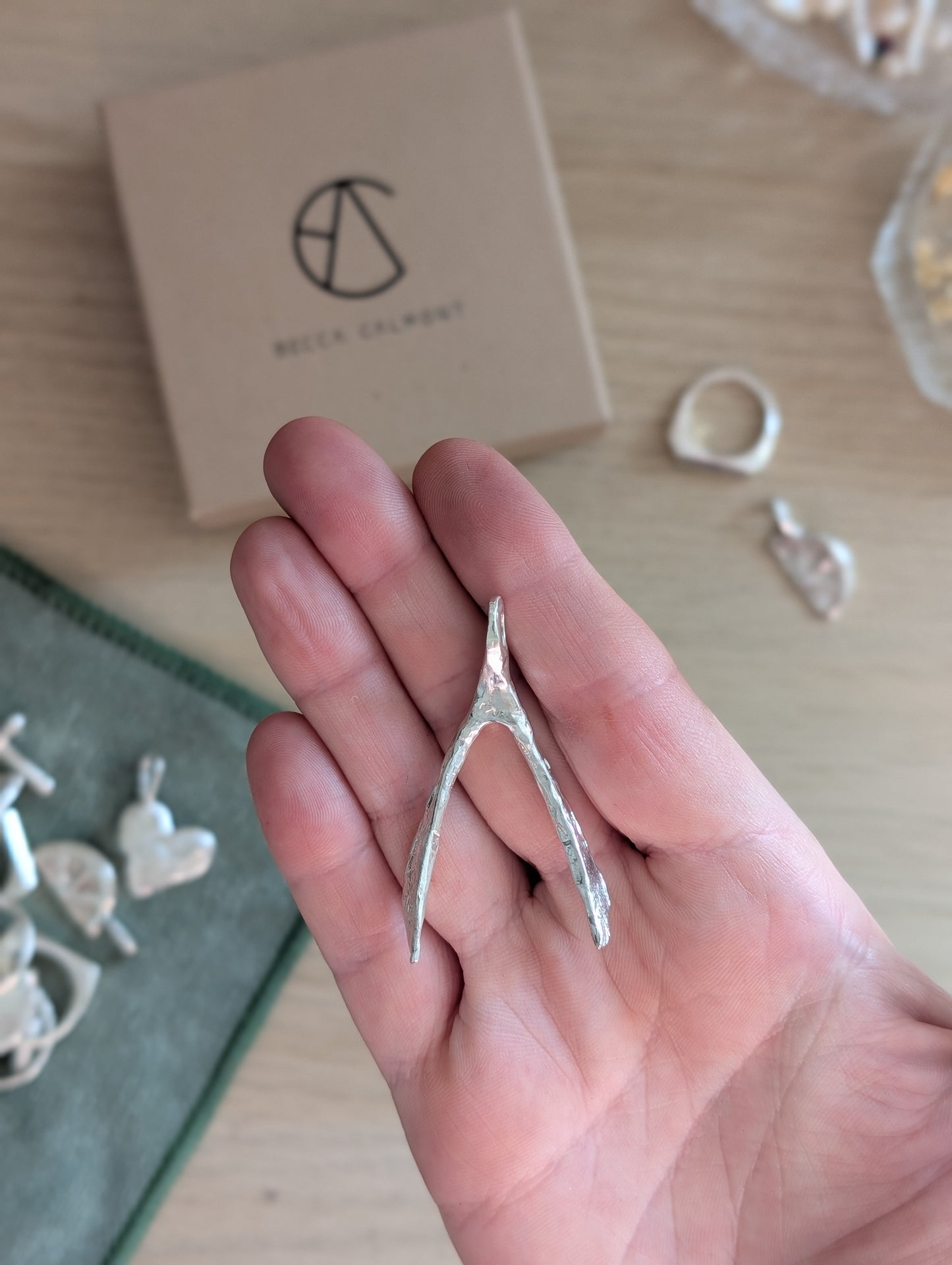 Untapped Potential silver Wishbone Pendant