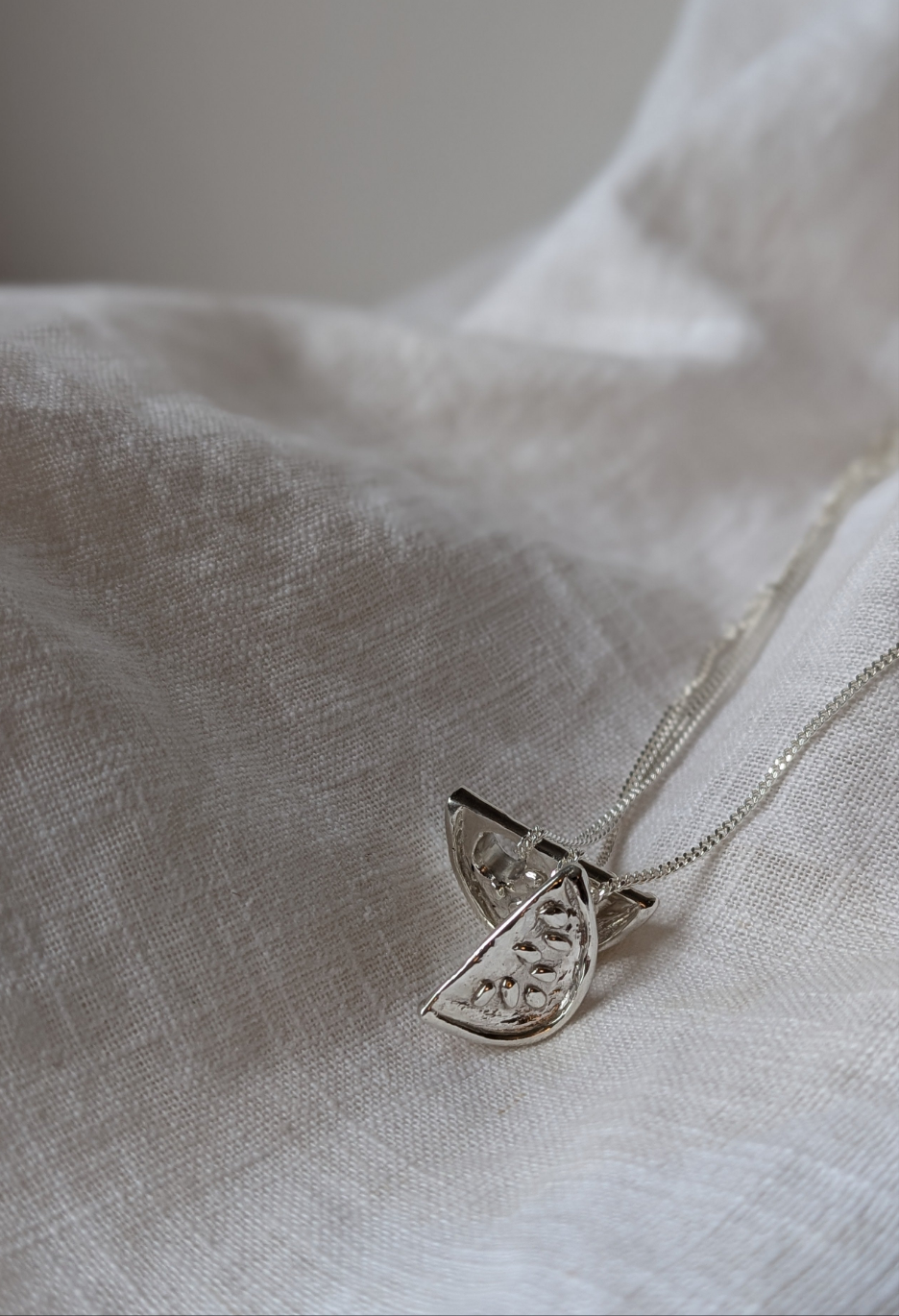 Silver watermelon necklaces 