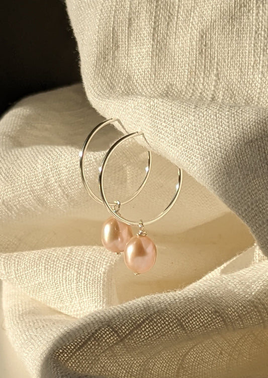 Pearl drop hoops in silver