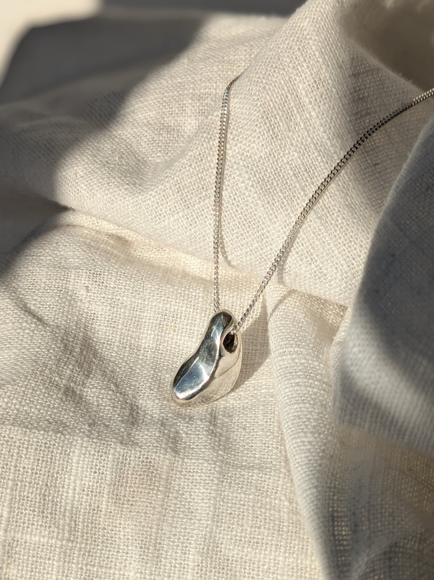 Vague thought silver pendant