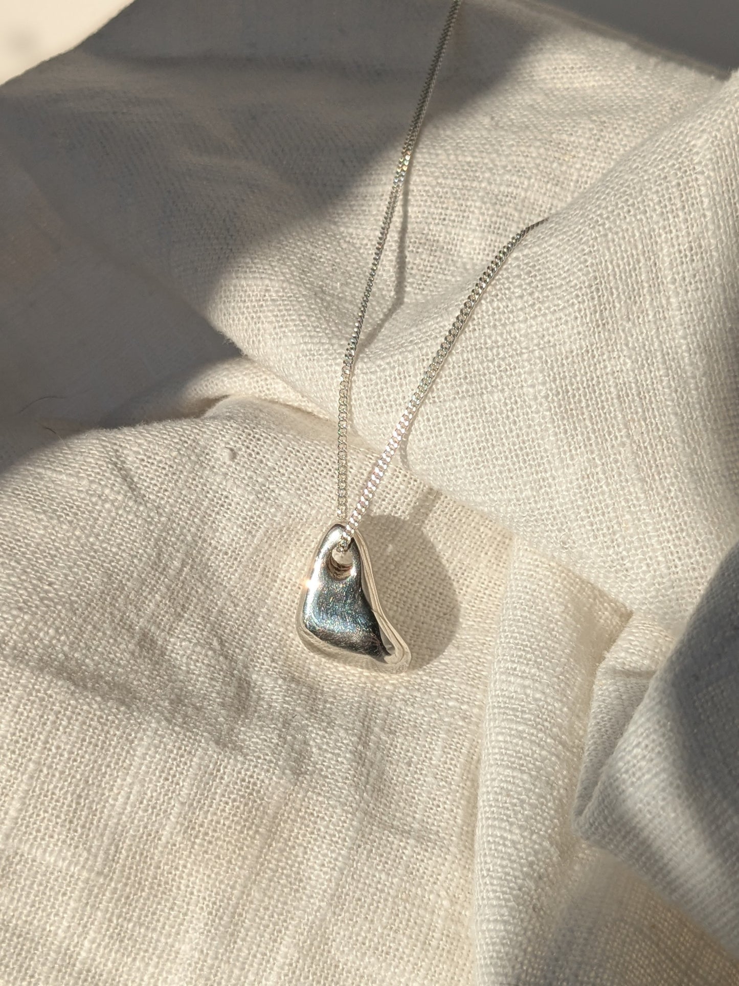 Vague thought silver pendant