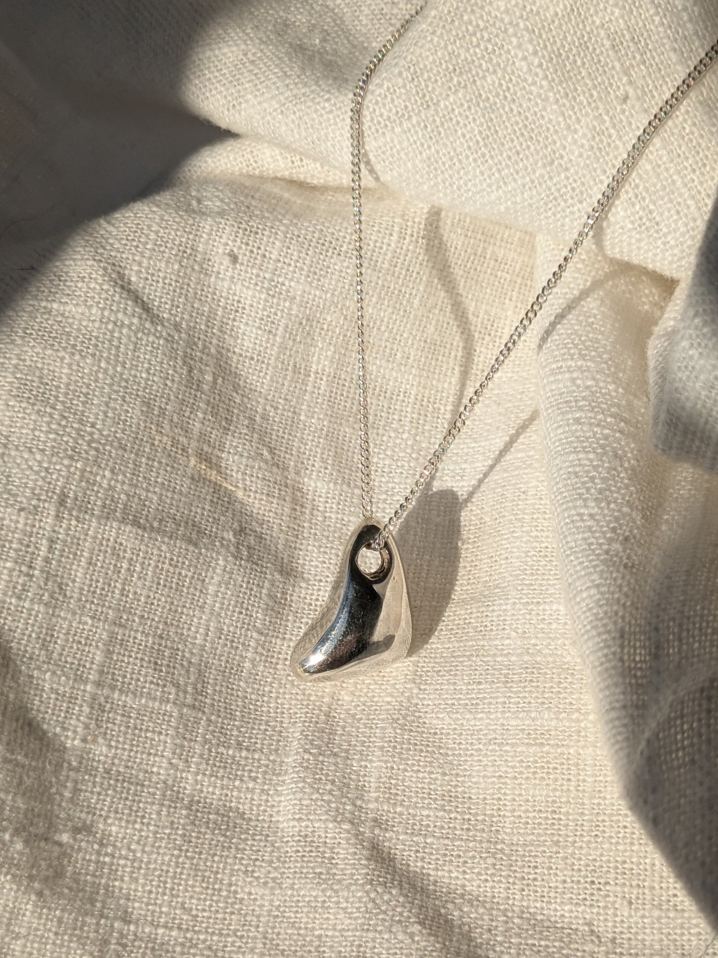 Vague thought silver pendant