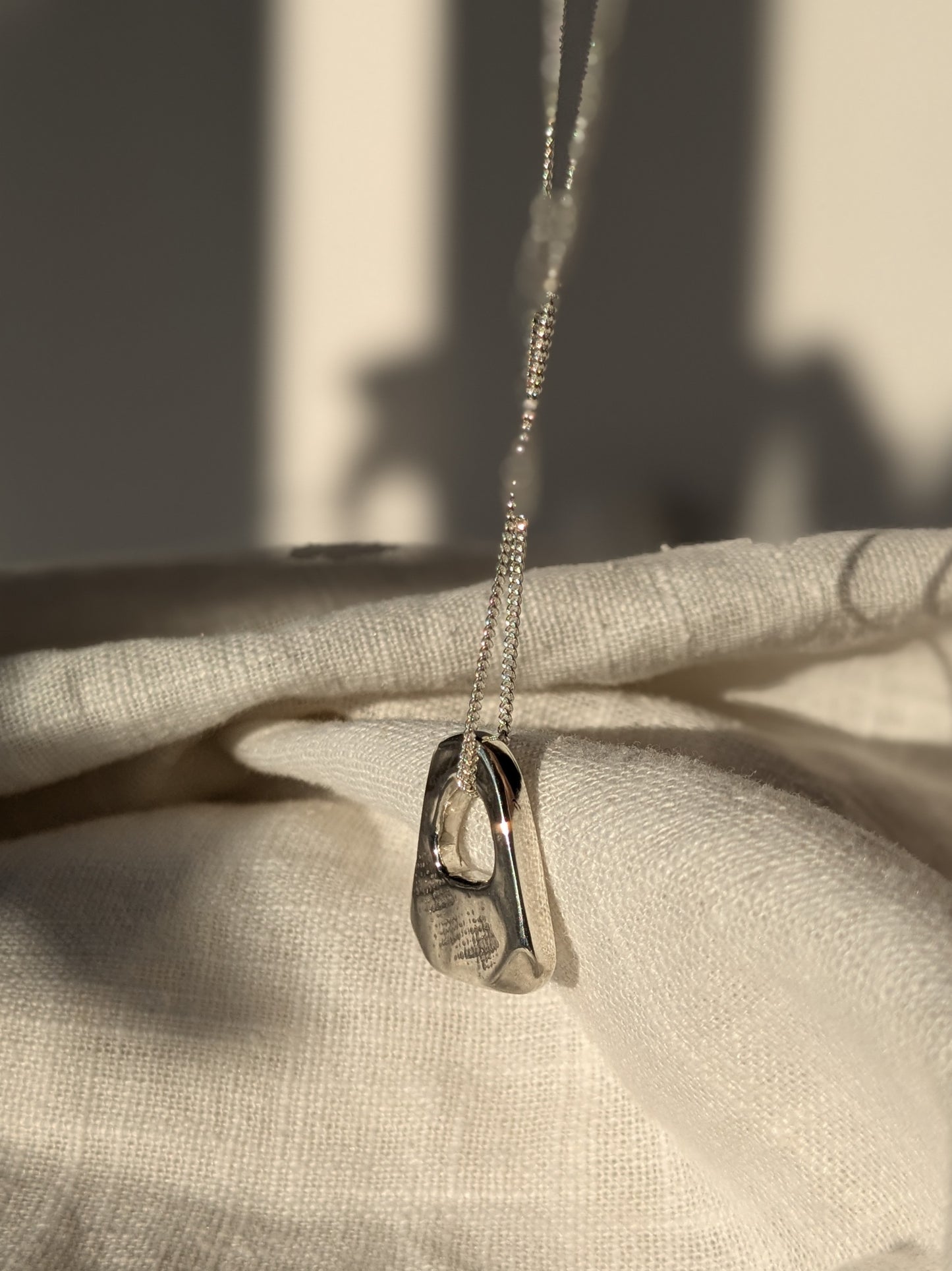 Linen Shape Silver Pendant Necklace