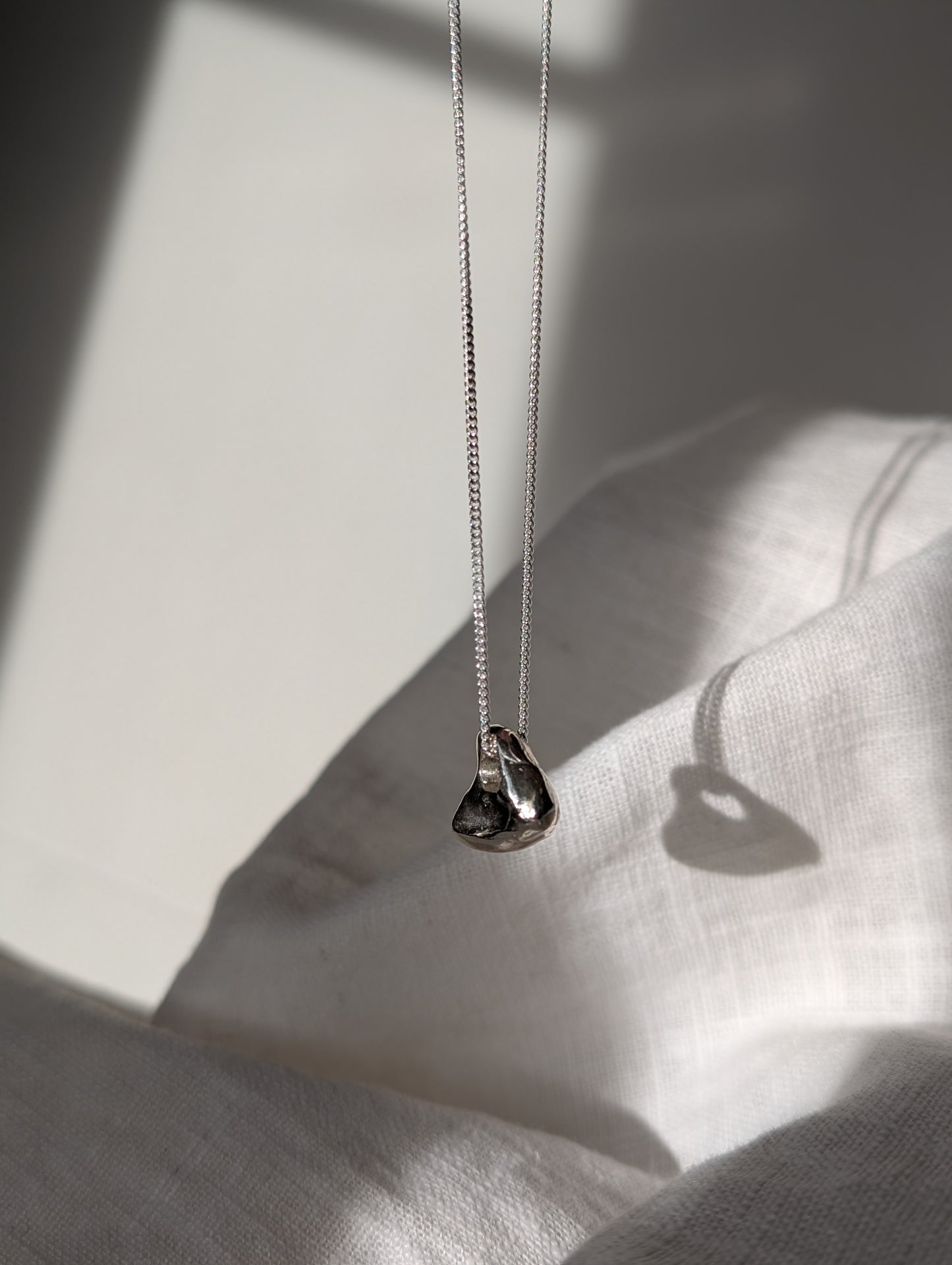 Hag stone silver necklaces