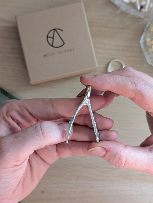 Untapped Potential silver Wishbone Pendant