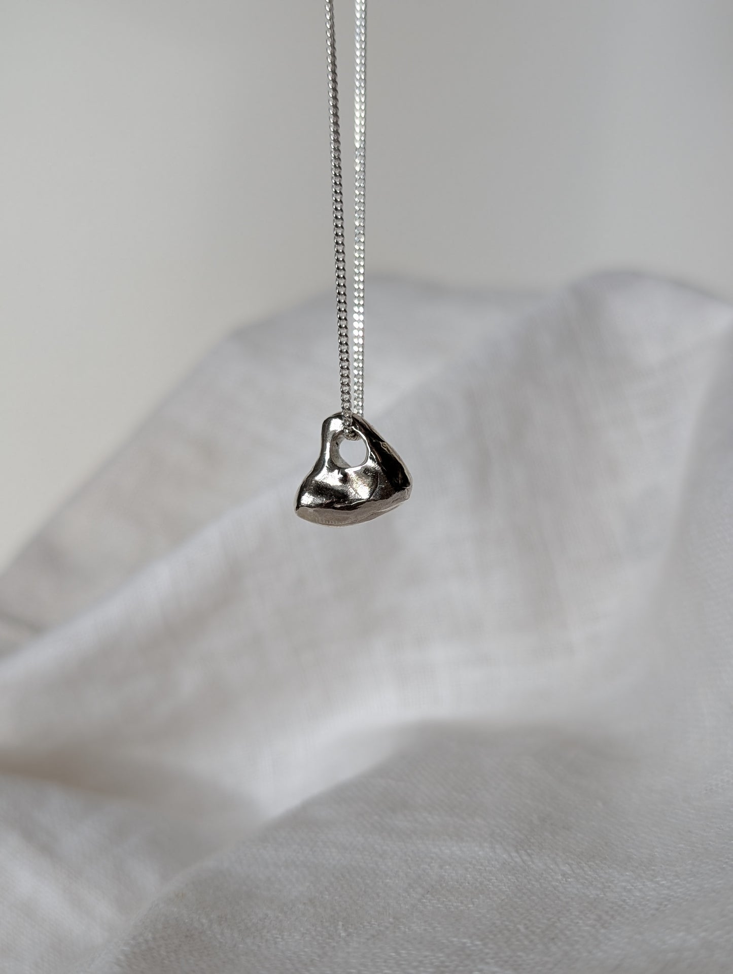 Hag stone silver necklaces