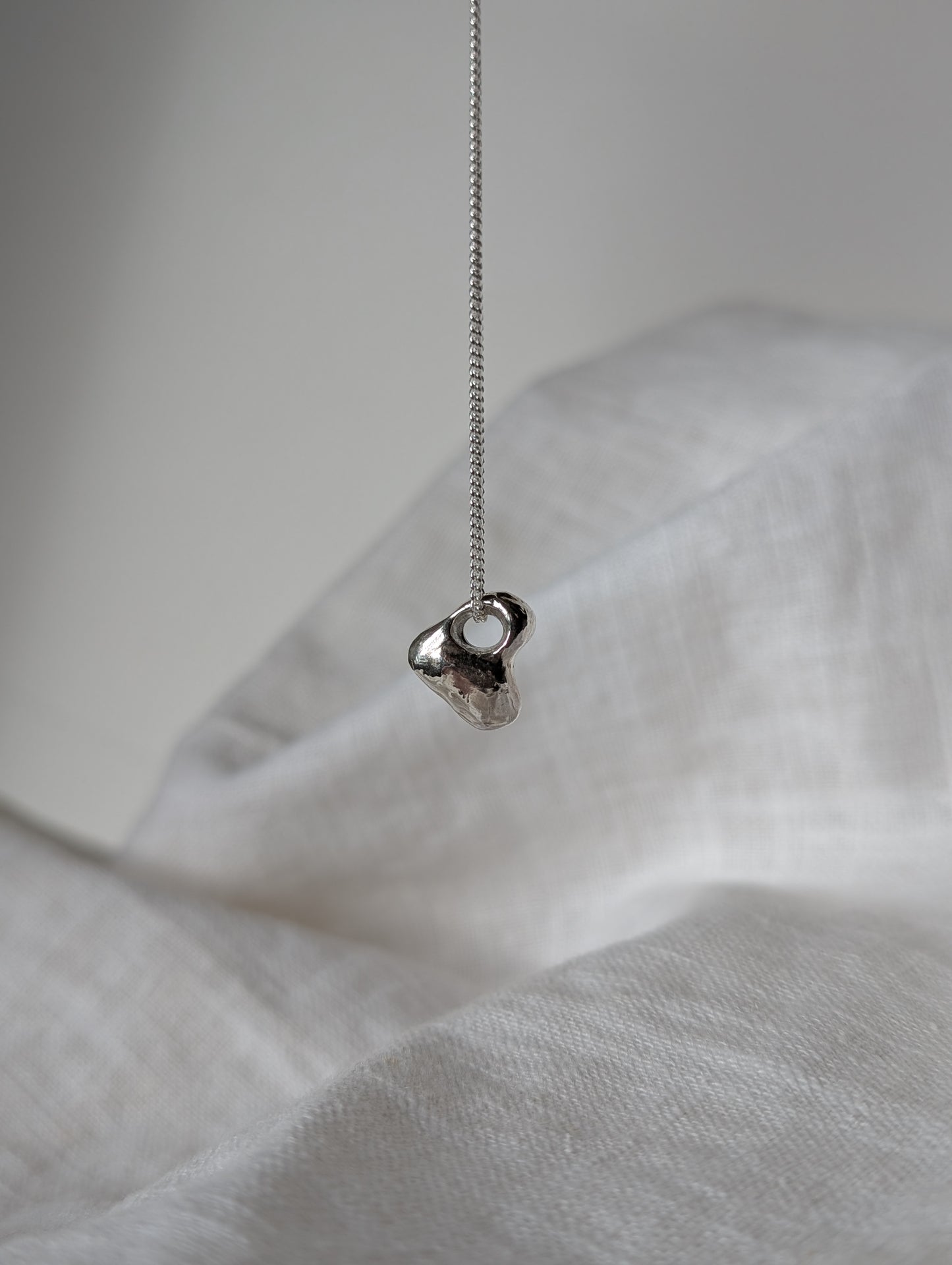 Hag stone silver necklaces