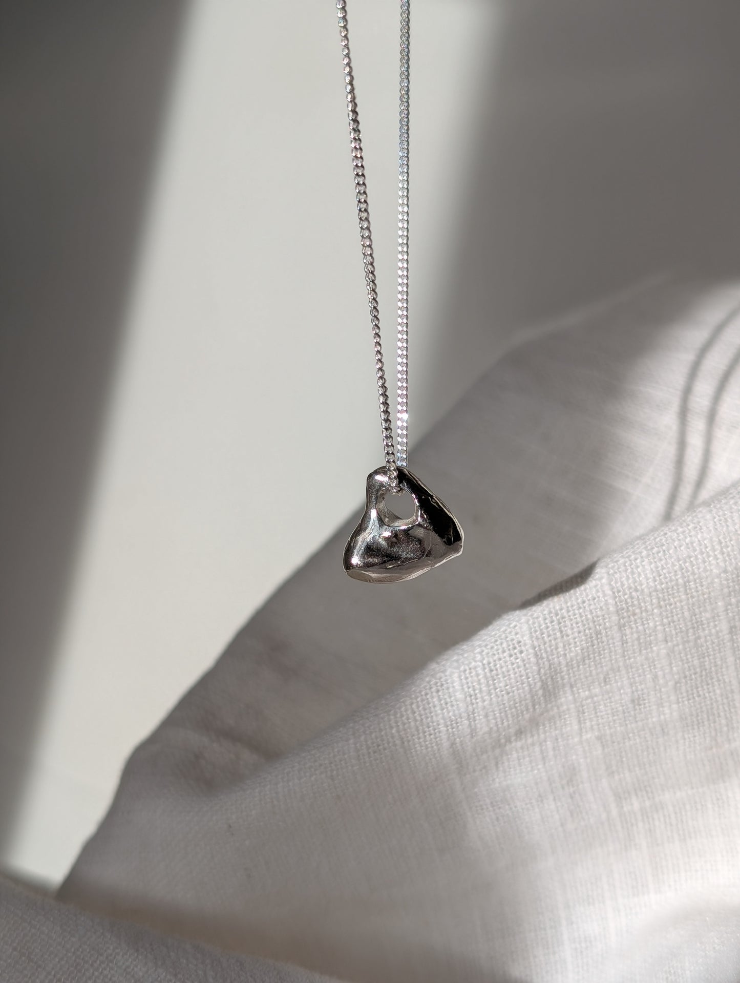 Hag stone silver necklaces