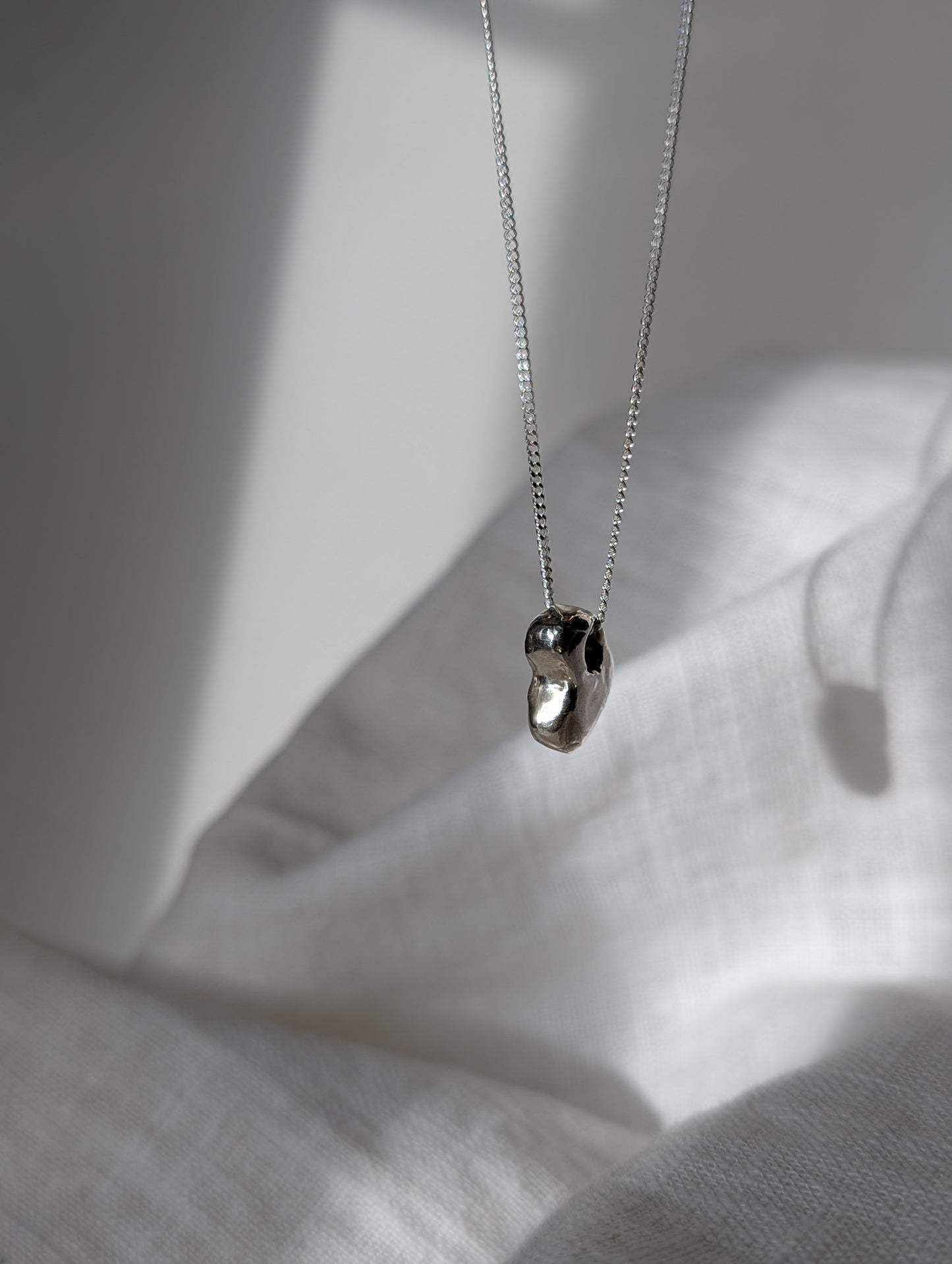 Hag stone silver necklaces