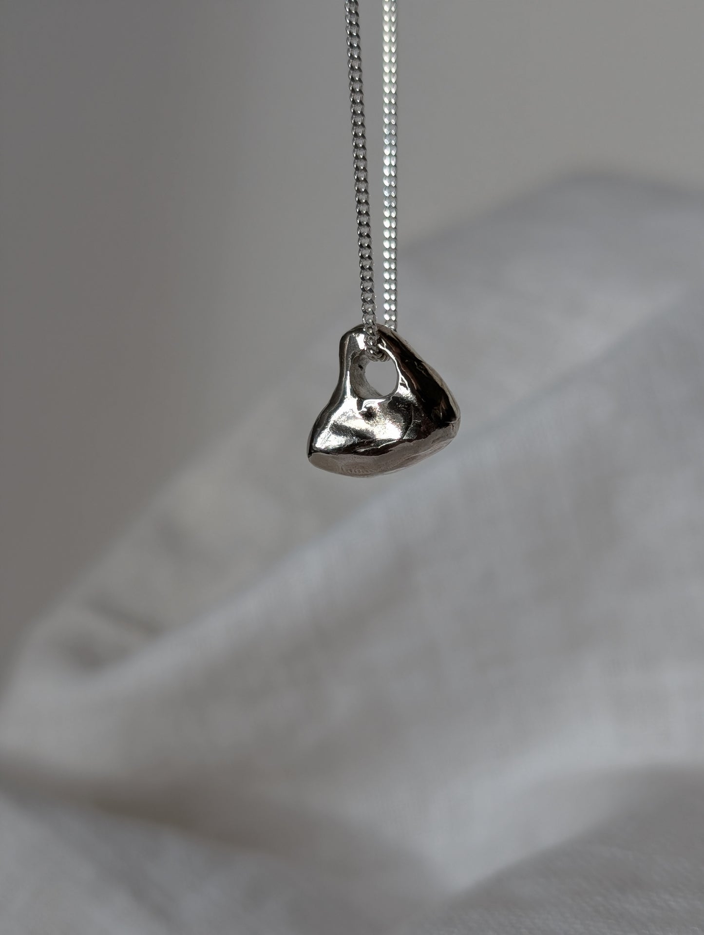 Hag stone silver necklaces