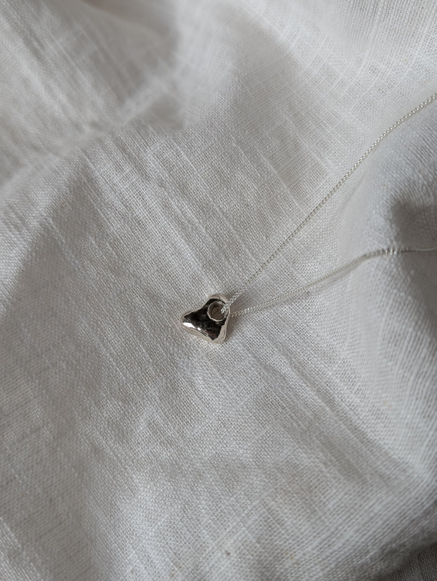 Hag stone silver necklaces